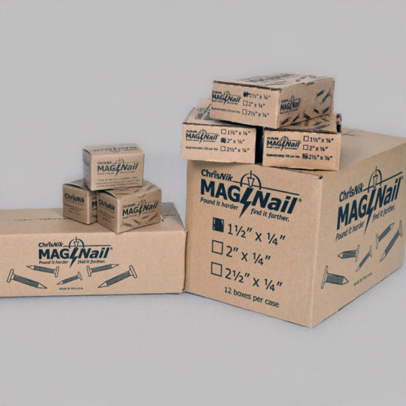 Cardboard boxes with MagNail branding on a gray background